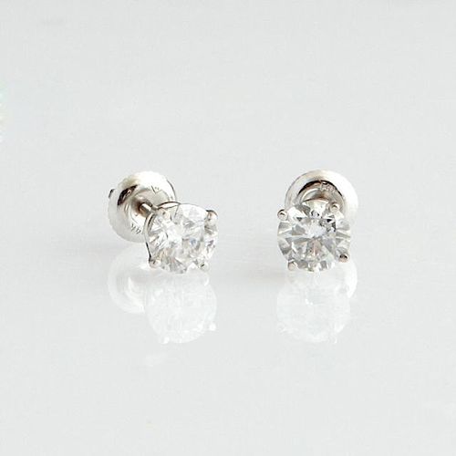 Pair of 14K White Gold Diamond Stud Earrings, each