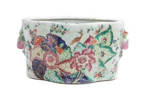 A Chinese Export Style 'Tobacco Leaf' Cache Pot Length 16 inches.