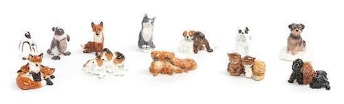 A Collection of Diminutive Porcelain Animal Figures Height of tallest 3 inches.