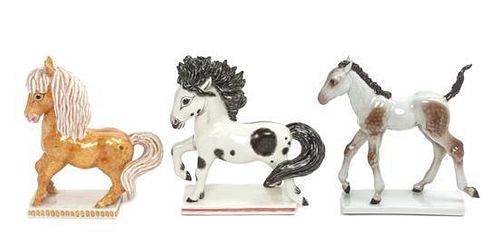 Three German Porcelain Horses Height of tallest 6 inches.