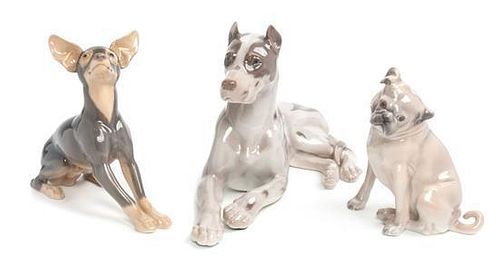 Three Bing & Grondahl Porcelain Figures Width of widest 11 1/2 inches.