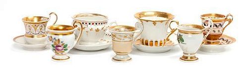 * A Collection of Continental Porcelain Cups and Saucers Height of tallest cup 4 5/8 inches.
