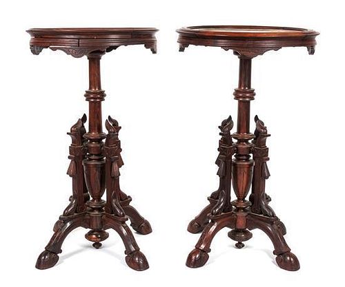 * A Near Pair of Victorian Walnut Pedestal Tables Height of taller 29 x diameter 17 3/4 inches.