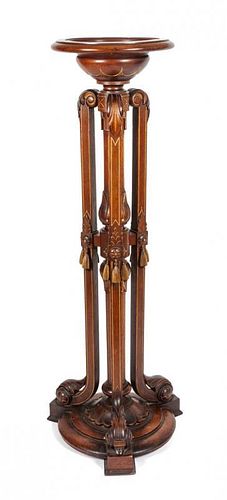 * A Victorian Walnut Carved Pedestal Height 48 1/4 inches.