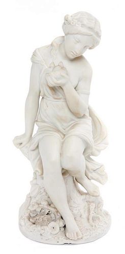 * A Parian Ware Figure Height 13 3/4 inches.