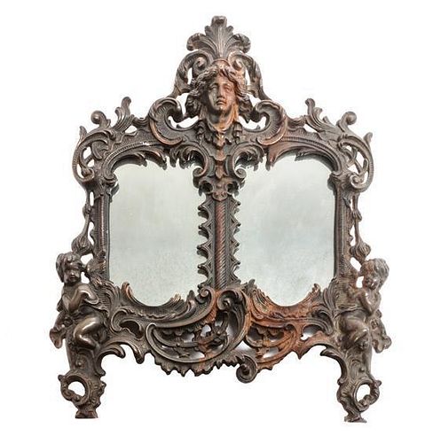 * A Continental Bronze Table Mirror 13 1/2 x 12 inches.