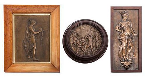 * A Cast Metal Plaque, , depicting a Classical female set in a maple frame, together with two additional reliefs.