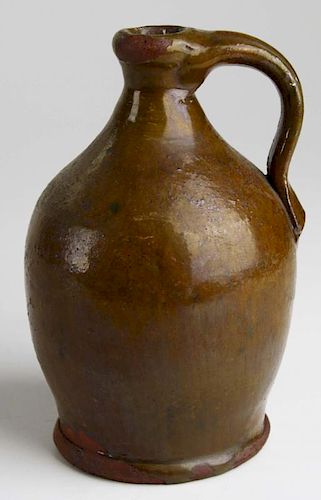 early 19th c redware ovoid jug, minor glaze pockmarking, ht 6.5”