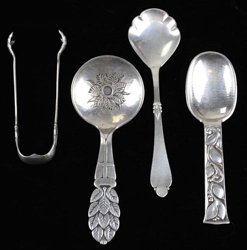 group of Danish Arts & Crafts flatware pieces, including hammered sterling sugar tongs hallmarked CF