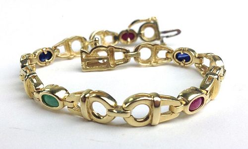 14k y.g. link bracelet with 5 small oval bezel set hard stones. 7"l, 17g.