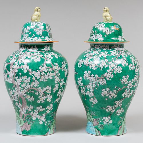 Pair of Chinese Green Ground Vases and Covers