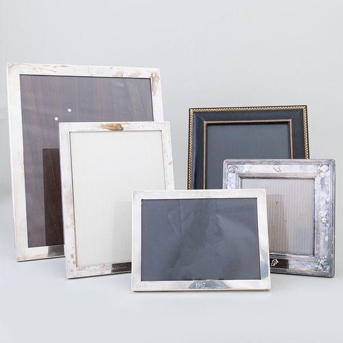 Group of Four Silver and Silver Plate Picture Frame and an Asprey Leather Picture Frame