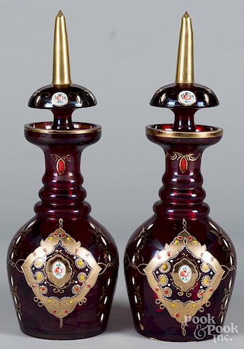 Pair of enameled ruby glass decanters, late 19th c., 18 1/4'' h.