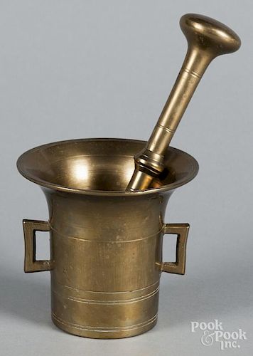 Brass mortar and pestle, 18th c., 7 1/2'' h.