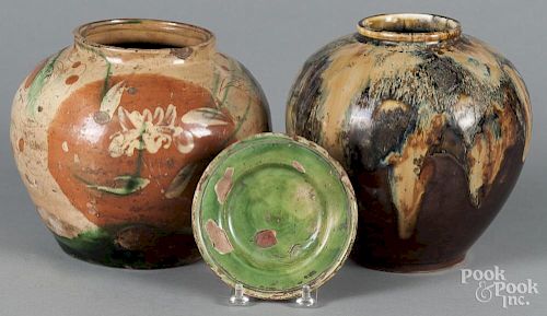 Two Oriental pottery urns, 7 1/4'' h. and 6 3/4'' h., together with a small dish, 5'' dia.