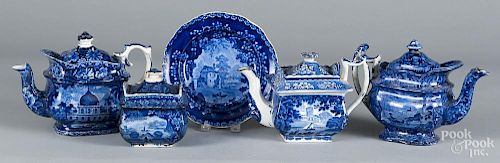 Three blue Staffordshire teapots, 19th c., together with a covered sugar and plate.