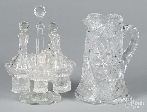 Cut glass cruet set, 10 1/4'' h., together with a pitcher, 9'' h.