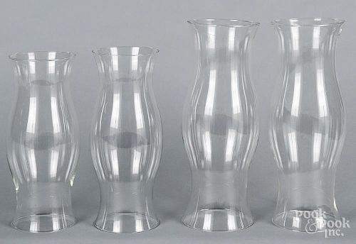 Two pairs of glass hurricane shades, 20th c., 16 1/2'' h. and 14'' h.
