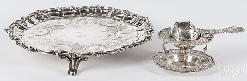 German 800 silver tea strainer, together with a plated salver