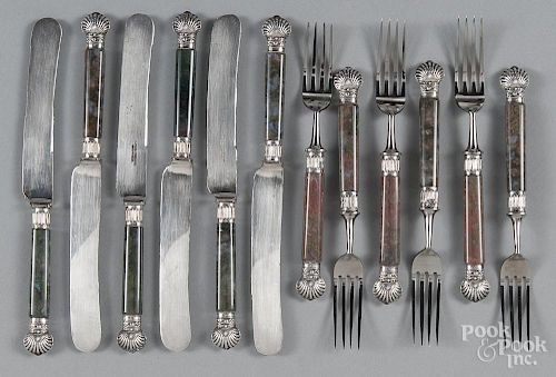 Twelve English silver and hardstone handled utensils.