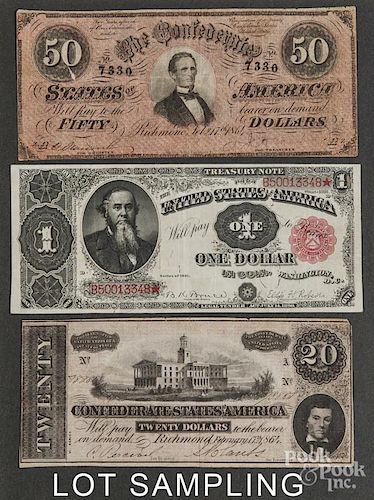 Confederate paper currency and colonial indented bills.