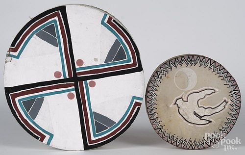 Two Native American painted hide drums, together with a hanging hide painting of a bear, 24'' dia.