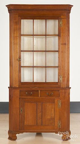Pennsylvania walnut two-part corner cupboard, ca. 1800, 87 1/2'' h., 40 1/2'' w.