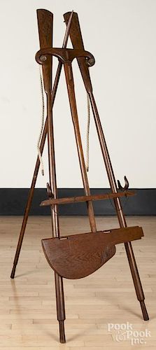Folk art nautical easel, constructed with oars, a boat hook, oar locks, and a rudder, 70'' h.