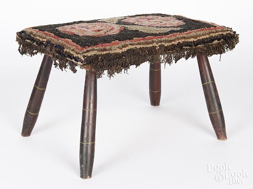 New England painted stool, 19th c., with a hooked rug cover, 11'' h., 18'' w.