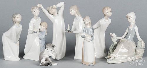Eight Lladro porcelain figurines, tallest - 8 1/2''.