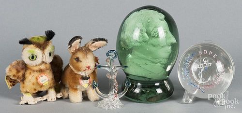 Two glass paperweights, together with a Venetian glass anchor and two Steiff animals.
