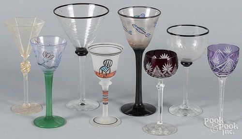 Eight art glass wines, tallest - 10 1/4''.