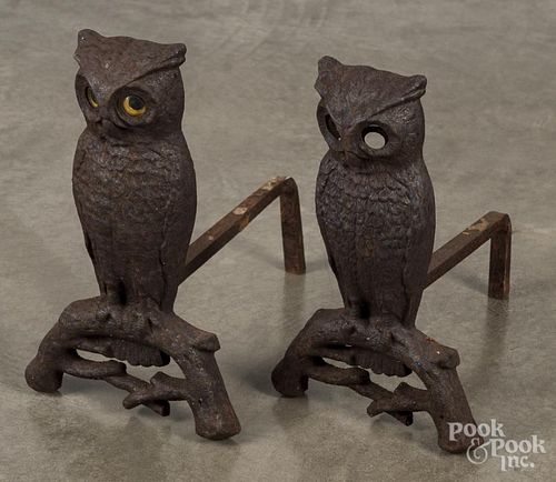 Pair of cast iron owl andirons, 19th c., 15 1/2'' h., together with a single owl.