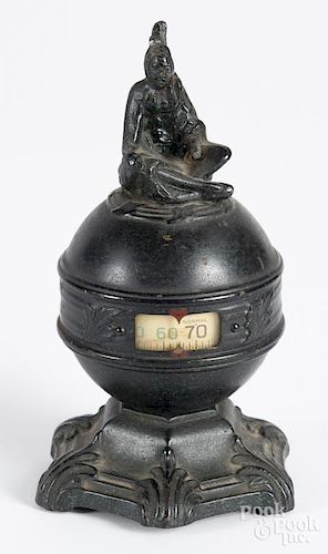 Desk top Thermo-dial Thermometer, 20th c., with a seated Native American Indian finial, 6 1/2'' h.