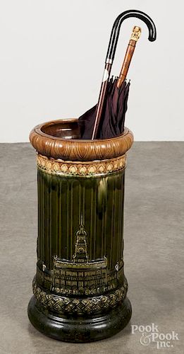 Majolica umbrella stand with a relief of Independence Hall, 22'' h., together with a Japanese parasol