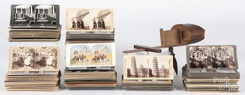 Approximately 200 stereo viewer cards, ca. 1900, together with a stereo viewer.