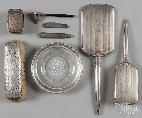 Sterling silver mounted dressing articles and accessories.