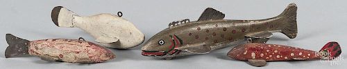 Four carved and painted fish decoys, mid 20th c., with line winders, longest - 8''.