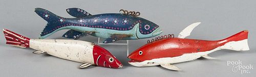 Three carved and painted fish decoys, mid 20th c., one attributed to Frank Mizera, longest - 9 1/2''.