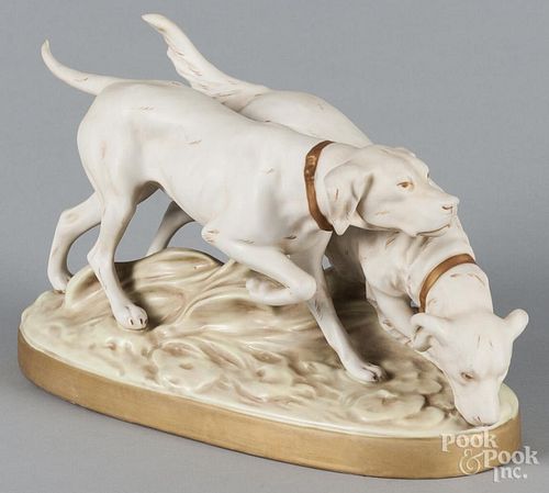 Royal Dux figure of two hounds, 9 1/2'' h., 16'' w.