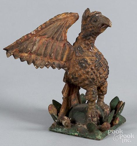 Carved and painted spread winged eagle, in the manner of Wilhelm Schimmel, 8'' h.