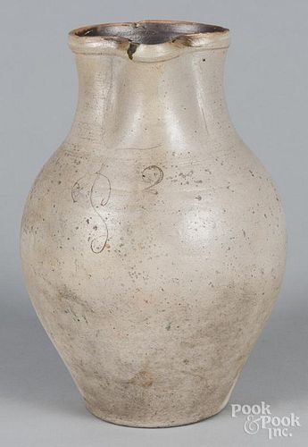 American two-gallon stoneware pitcher, 19th c., with incised script P, 14'' h.
