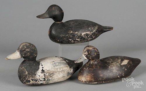 Three carved and painted duck decoys, 20th c., longest - 14''.