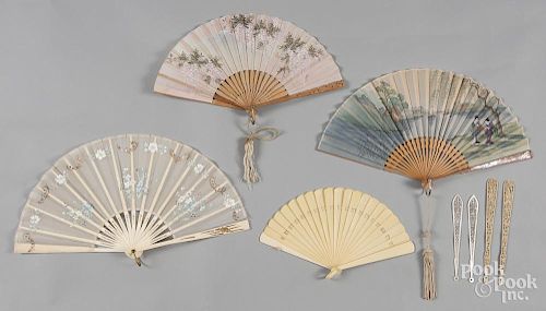 Oriental hand fans, to include ivory examples.