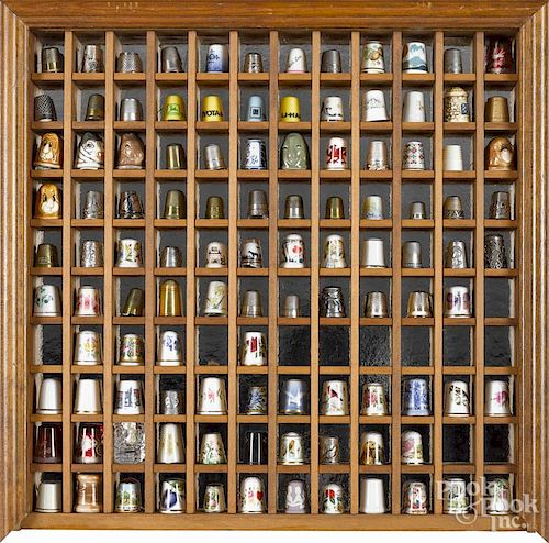 Cased thimble collection, 16'' x 16 1/4''.