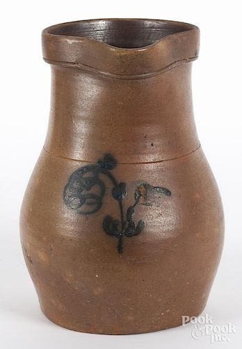 Stoneware pitcher, 19th c., with cobalt floral decoration, 10 1/2'' h.