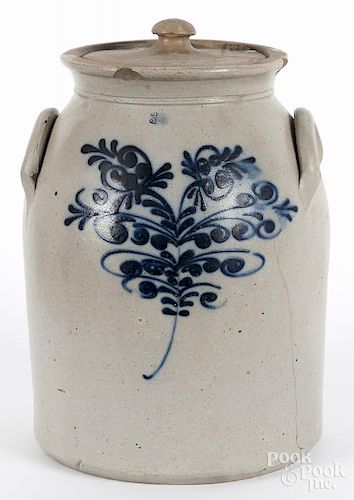 Three-gallon stoneware lidded crock, 19th c., with cobalt floral decoration, 14'' h.