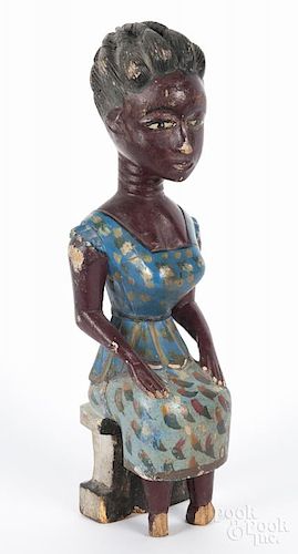 Carved and painted figure of a seated woman, 20'' h.
