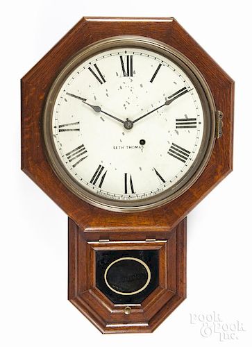 Seth Thomas oak wall clock, 19th c., 24'' h.