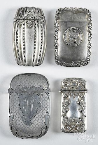 Four sterling silver match vesta safes, ca. 1900, largest - 2 3/4'' h.